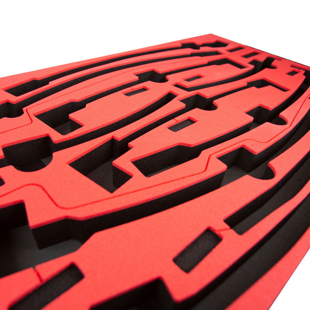 CNC routed routed foam in red and black to organise tools